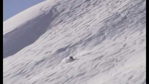Skiing powder down from valluga in st. anton am arlberg