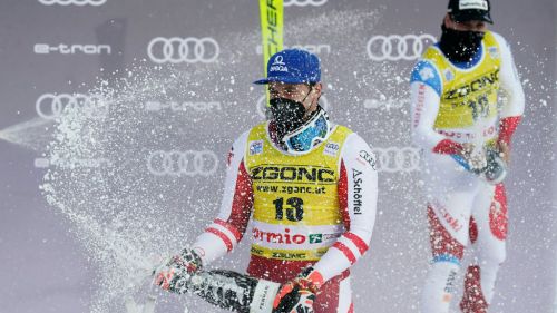 Matthias Mayer near Kilde's red bib, overtaking (but earning little) Pinturault in overall